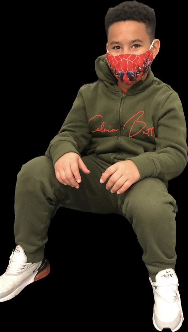 Youth in Calvin Butts apparel
